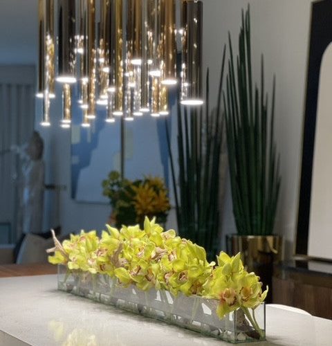 48″ Casa Moderna glass plate planter with green Cymbidium orchids